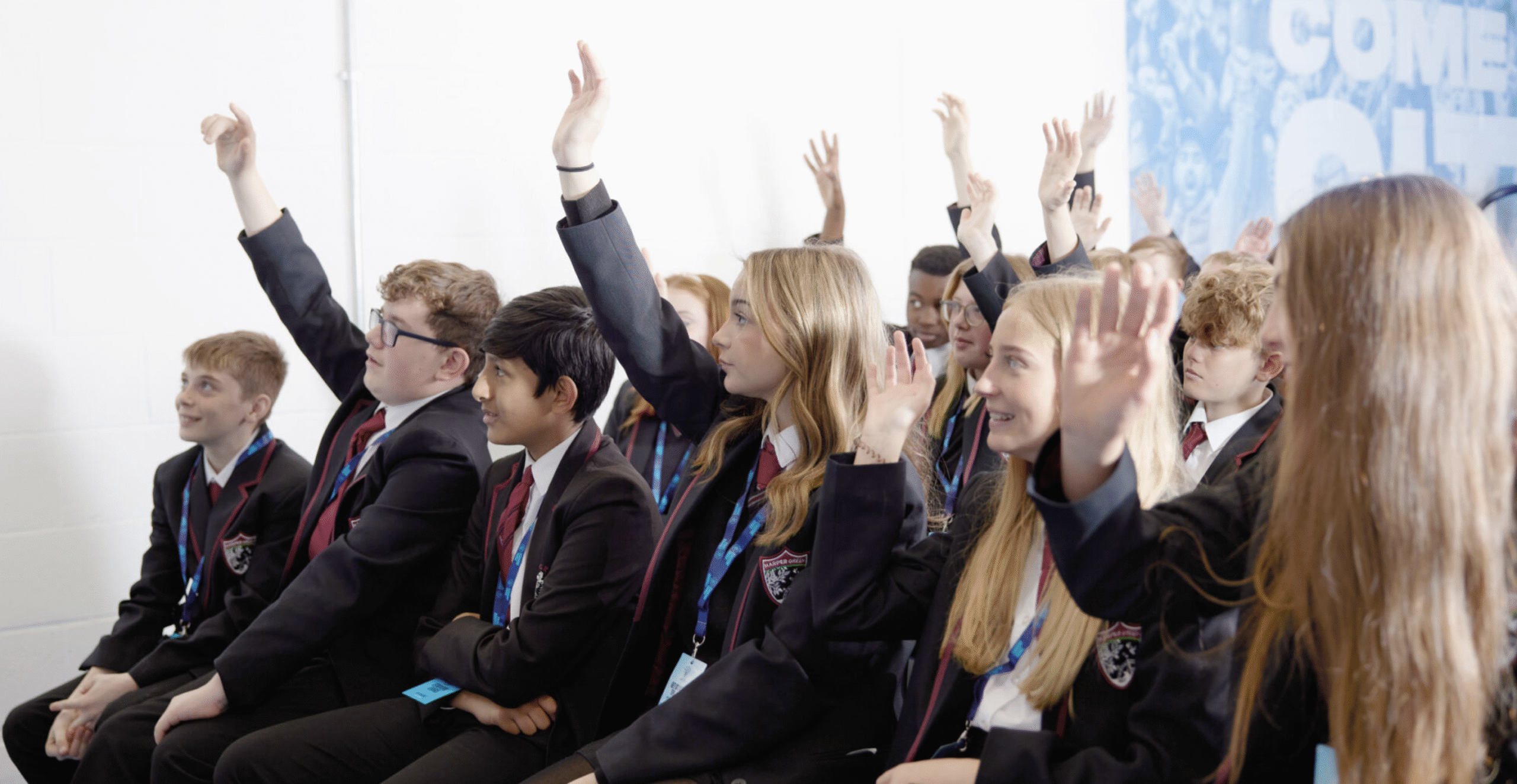 Students participating in Manchester City FC educational tour activities